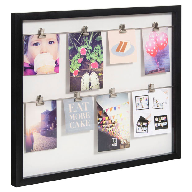 6 formas de integrar recuerdos de viaje en decoracion marco foto negro