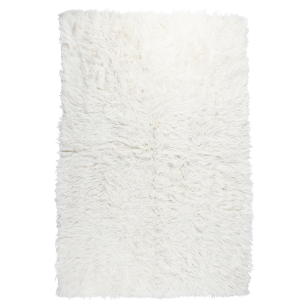 como-decorar-inspirado-serie-favorita-alfombra-flokati-blanco